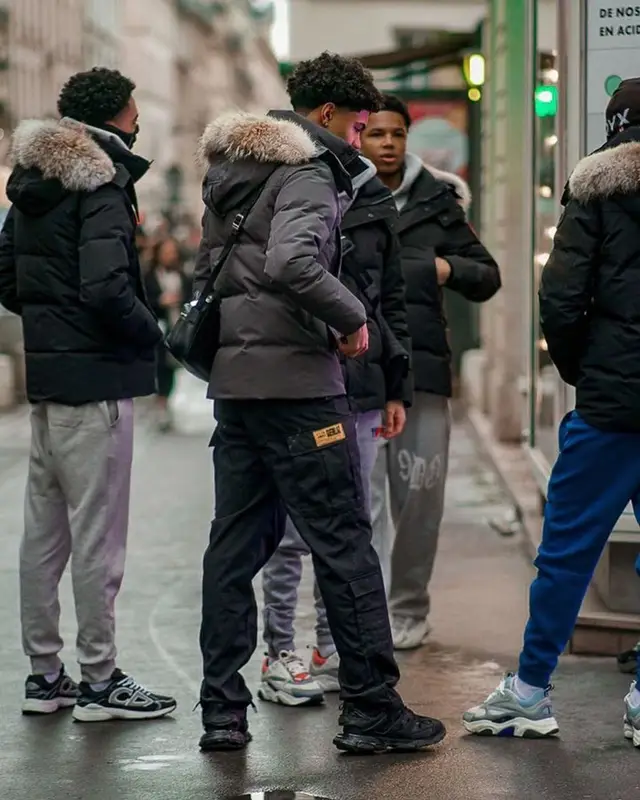 Aj Barbour outfit in Canada Goose, Stone Island, and Louis Vuitton, 2022