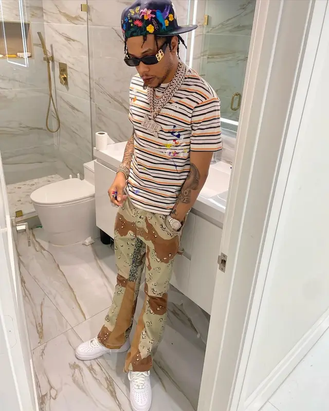 Lil Migo outfit in Gallery Dept., Balenciaga, and New Era, 2023