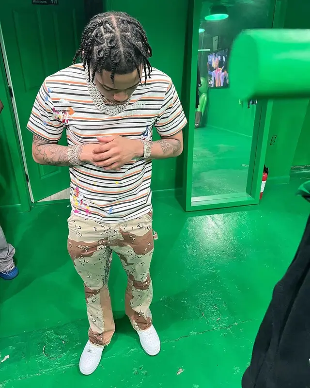 Lil Migo outfit in Gallery Dept., Balenciaga, and New Era, 2023