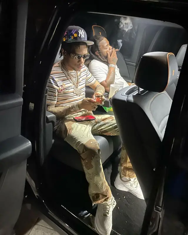 Lil Migo outfit in Gallery Dept., Balenciaga, and New Era, 2023