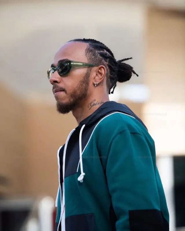 Lewis Hamilton outfit in Louis Vuitton, Gucci, and Nanushka, 2023
