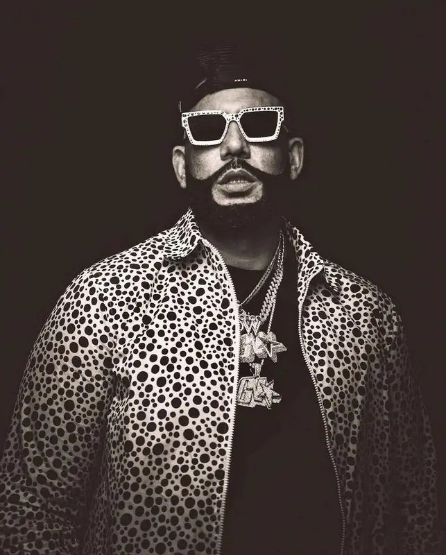 DJ Drama outfit in Louis Vuitton, Amiri, and Yayoi Kusama, 2023