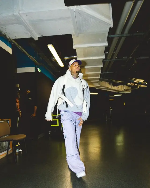 Chris Brown outfit in Dior, Pheit, and ERL, 2023