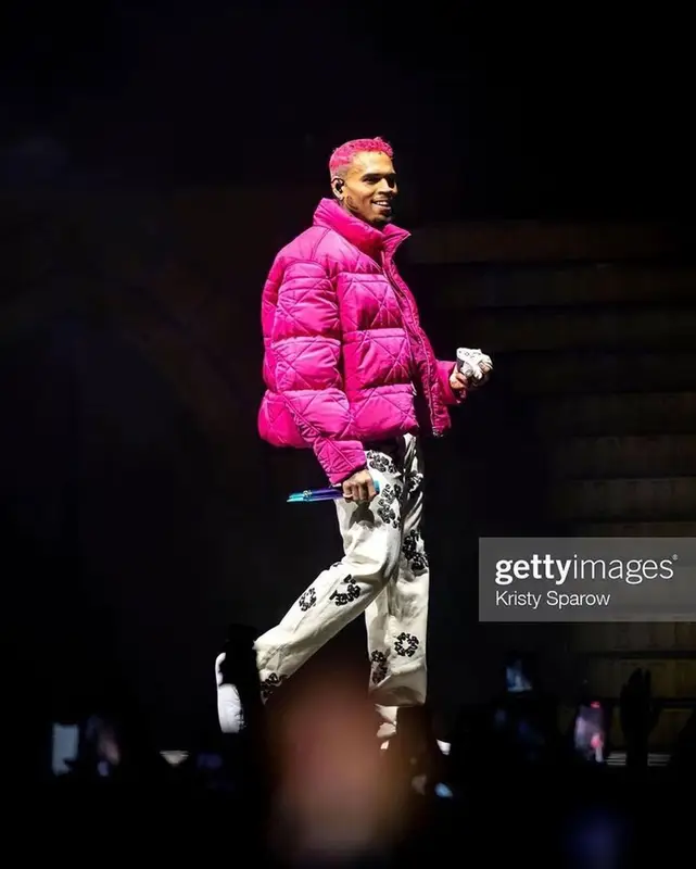 Chris Brown outfit in Dior, Denim Tears, and ERL, 2023