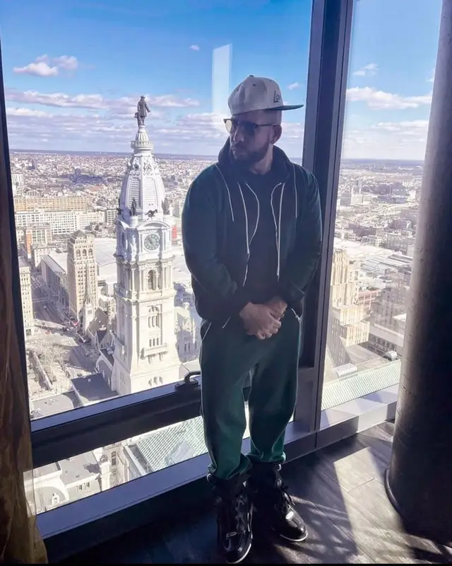 DJ Drama outfit in Louis Vuitton and Tom Ford, 2023