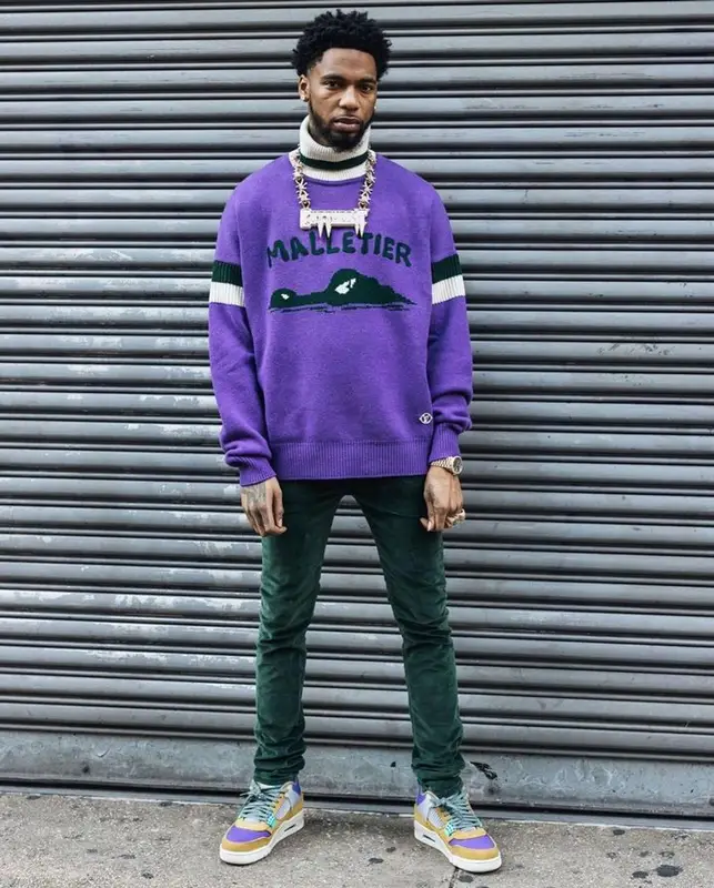 Key Glock outfit in Louis Vuitton, Amiri, and Jordan, 2023