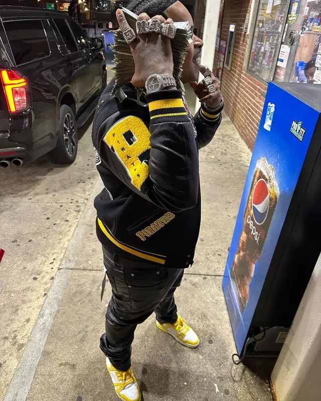 Finesse2tymes outfit in Pro Standard, Louis Vuitton, and Moschino, 2023
