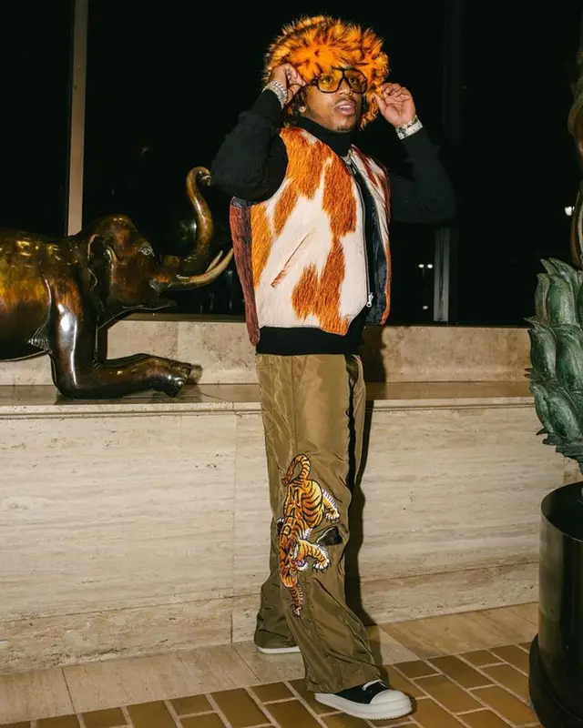 Jacquees outfit in Stussy, Market, and Tom Ford, 2023