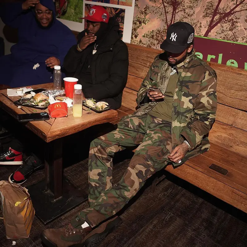 Dave East outfit in Rothco, Timberland, and New Era, 2023