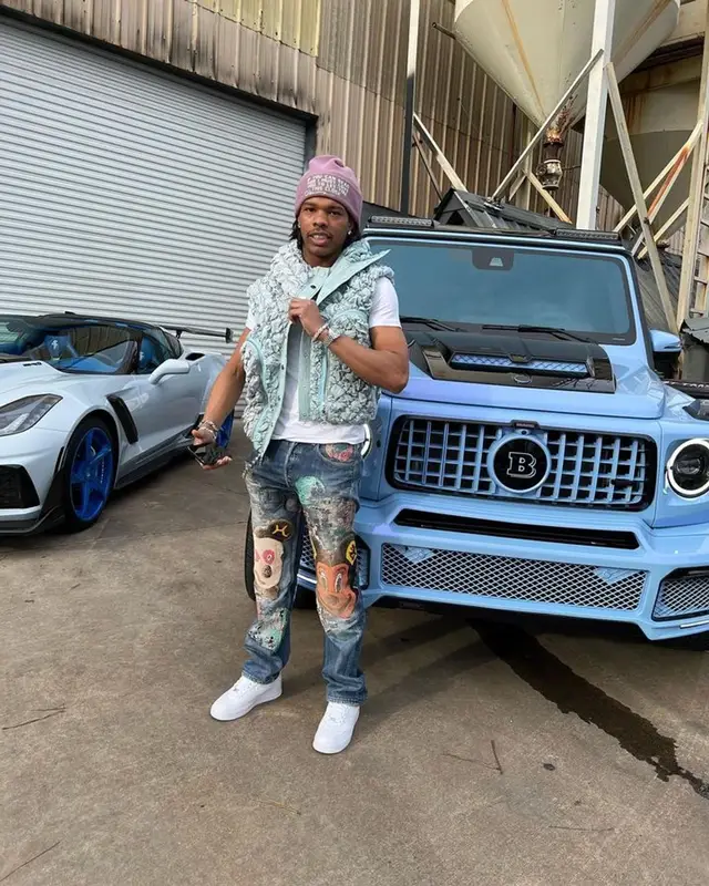 Lil Baby outfit in Nike, Cactus Jack, and Dior, 2023