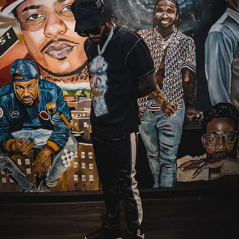 Dave East outfit in Jordan, Sanity4eva, and New Balance, 2023