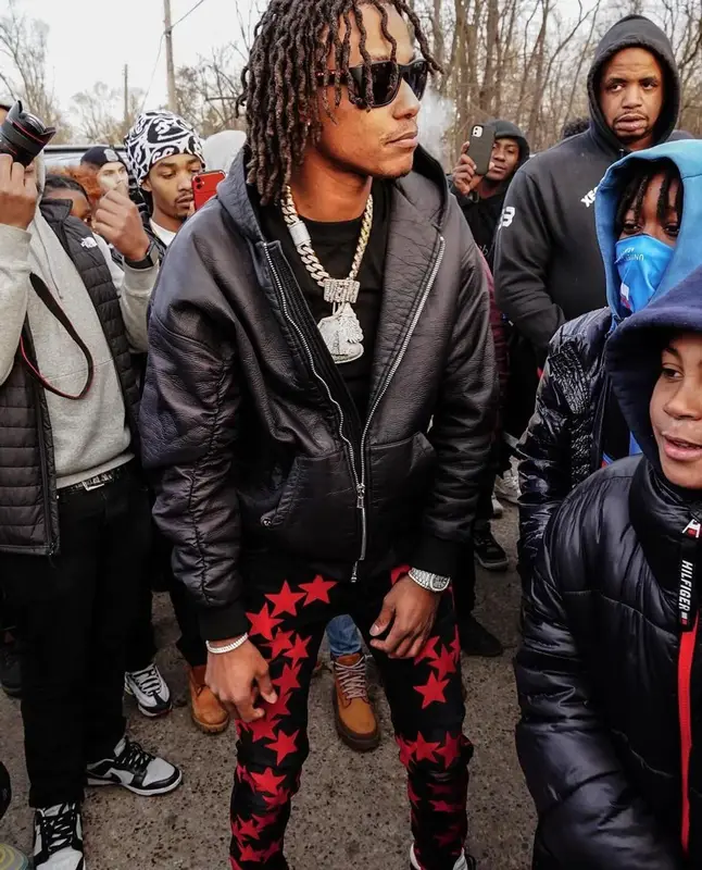 Skilla Baby outfit in 6PM Season, Chemist, and Amiri, 2023