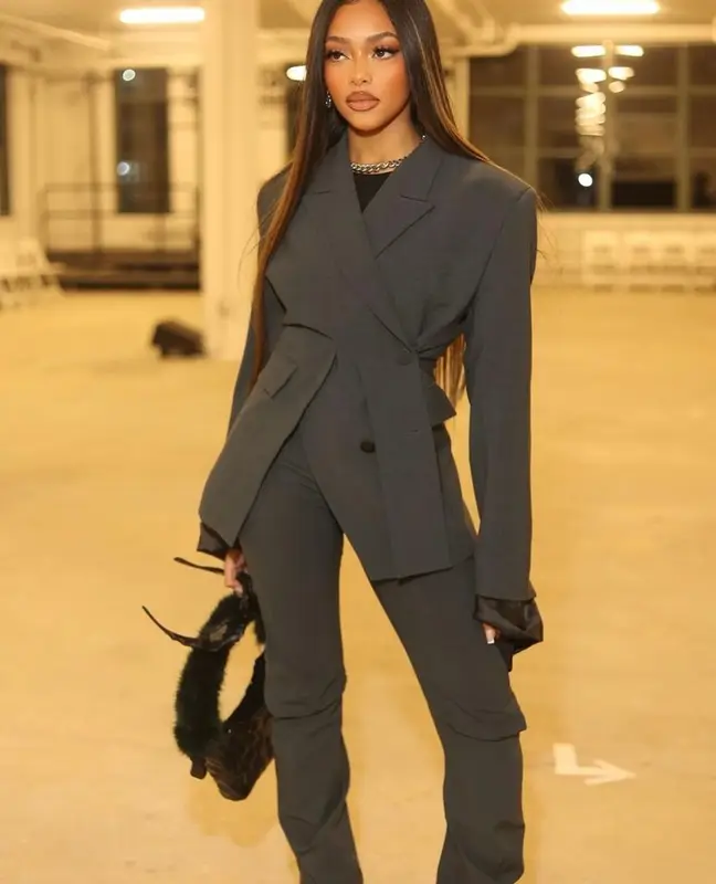 Jodie Woods outfit in Amina Muaddi and Ottolinger, 2023