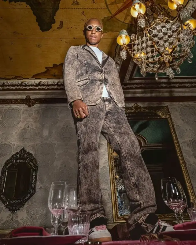 Pharrell Williams outfit in Miu Miu, Tiffany&Co, and Pharrell Williams Merch, 2023