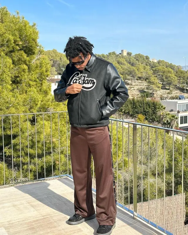 Jules Kounde outfit in La Fam, Kapital, and Oakley, 2023
