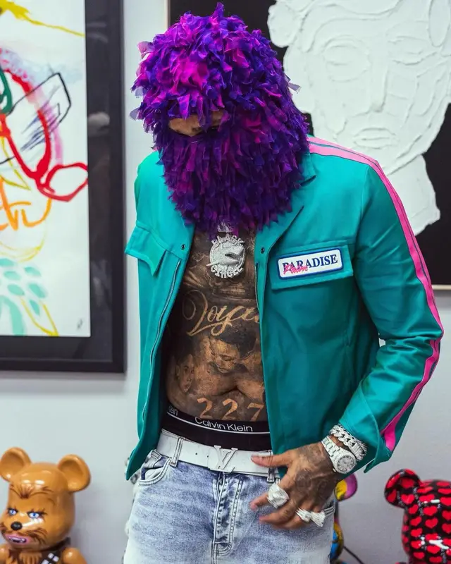 Money Man outfit in Palm Angels, Louis Vuitton, and Calvin Klein, 2023