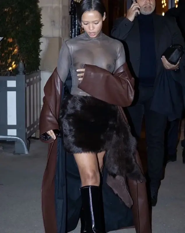 Taylor Russell outfit in Saint Laurent, Loewe, and Gentle Monster, 2023
