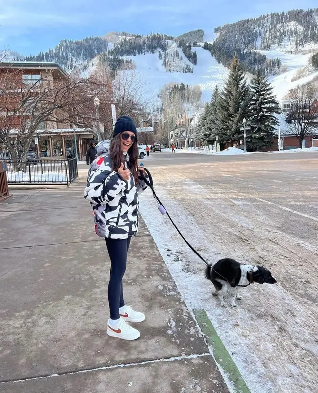 Nina Dobrev outfit in Prada and Nike, 2023