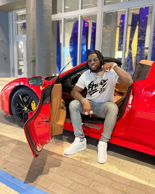 CJ So Cool outfit in Amiri, Louis Vuitton, and Gucci, 2023