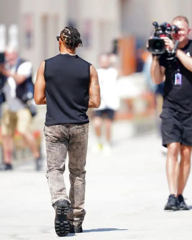 Lewis Hamilton outfit in Miu Miu and Retrosuperfuture, 2023