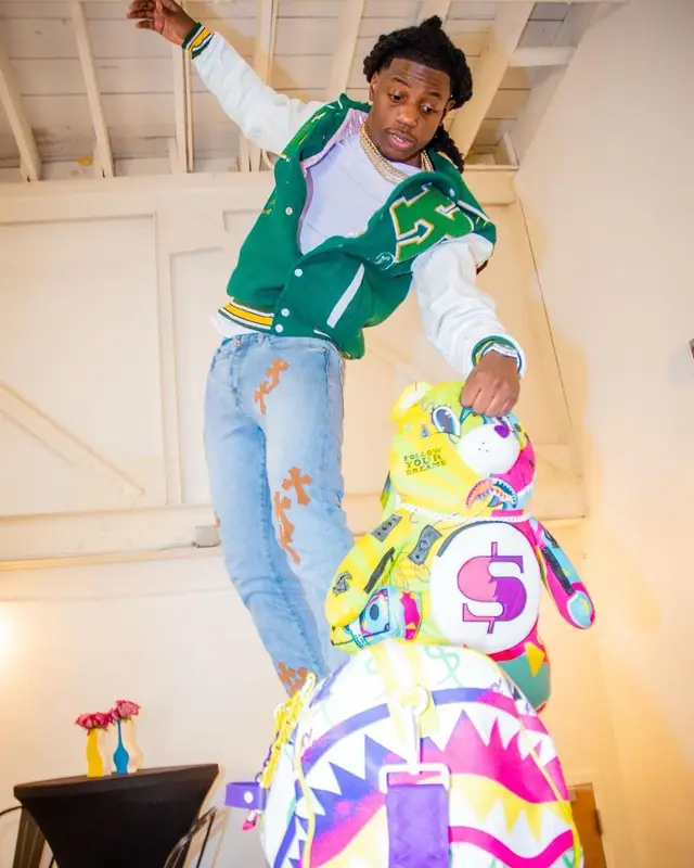 OMB Peezy outfit in Alexander McQueen and Sprayground, 2023