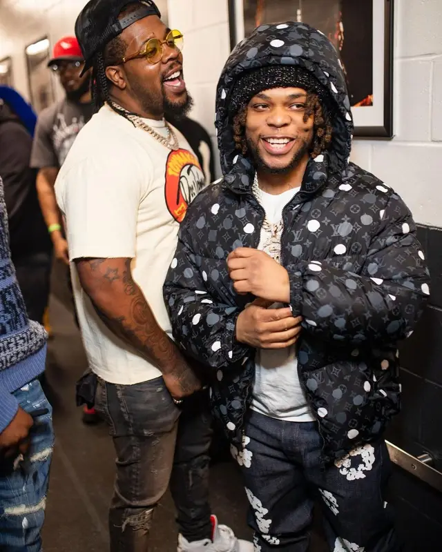 Don Q outfit in Louis Vuitton, Denim Tears, and Nike, 2023