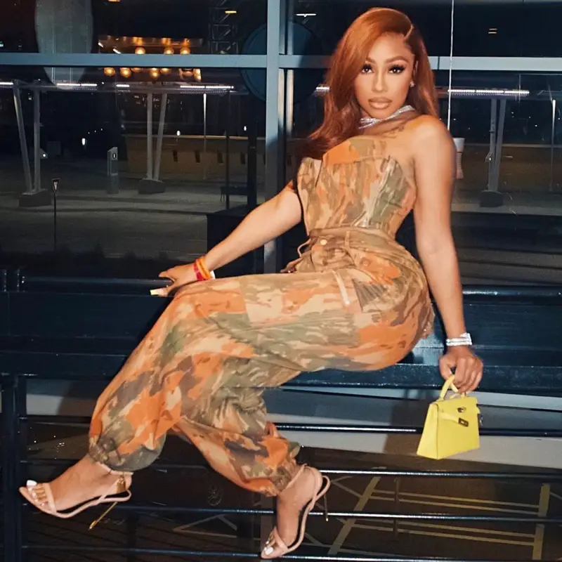 Yung Miami outfit in Dion Lee, Hermes, and Tom Ford, 2023