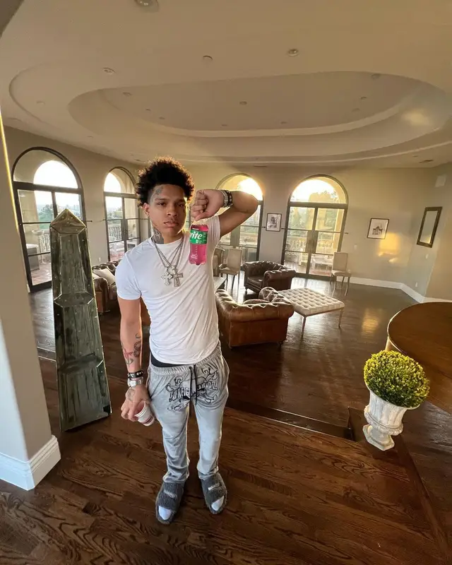 K Suave outfit in Hanes, Foreign Friendz, and Balenciaga, 2023