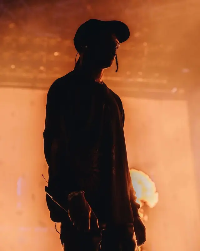 Travis Scott outfit in Maison Margiela, Travis Scott Merch, and Rolling Loud Merch, 2023