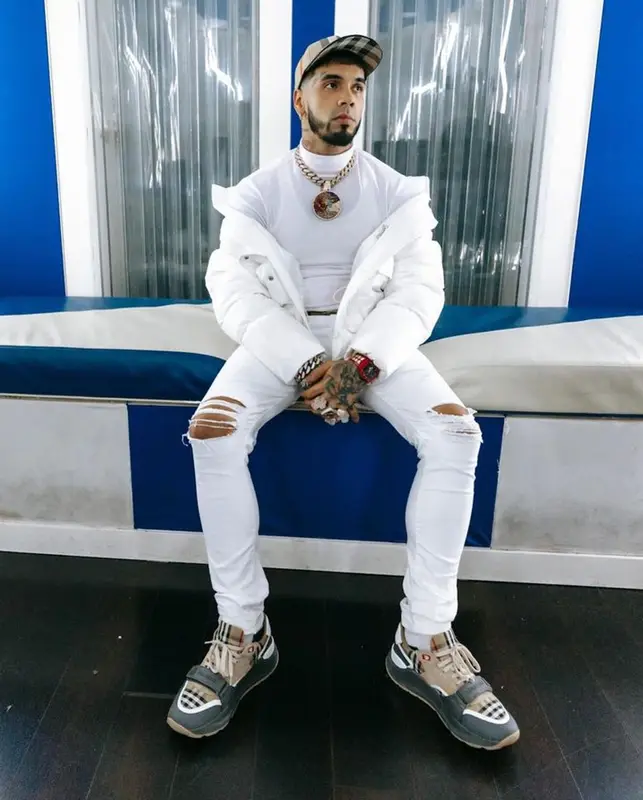 Anuel AA outfit in Moncler, Richard Mille, and Burberry, 2023