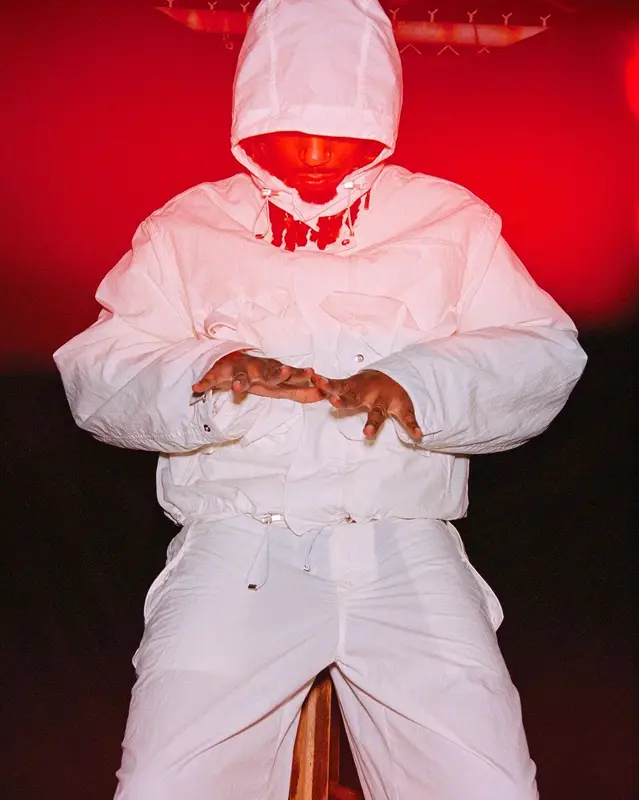 Metro Boomin outfit in Ferragamo, Nike, and Premium Goods, 2023