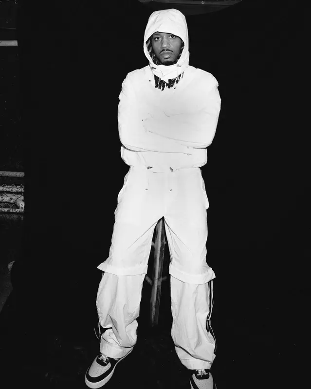 Metro Boomin outfit in Ferragamo, Nike, and Premium Goods, 2023