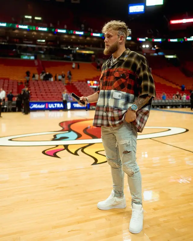 Jake Paul outfit in Amiri, Louis Vuitton, and Nike, 2023