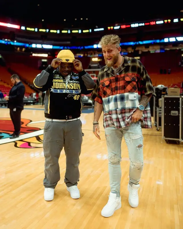 Jake Paul outfit in Amiri, Louis Vuitton, and Nike, 2023