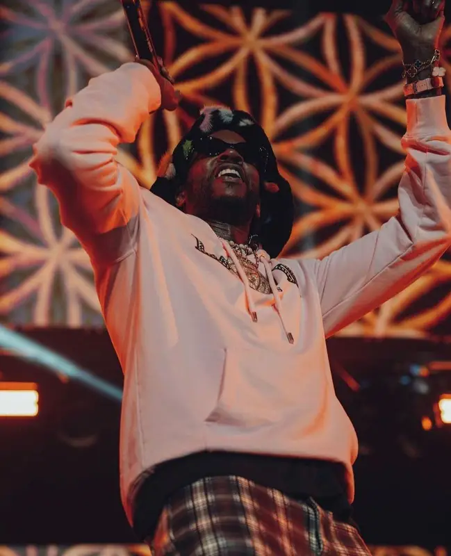 2 Chainz outfit in Lanvin, Maison Margiela, and Gentle Monster, 2023