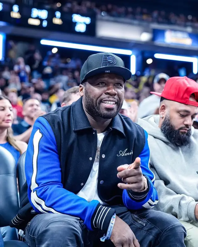 50 Cent outfit in Amiri, Louis Vuitton, and New Era, 2023
