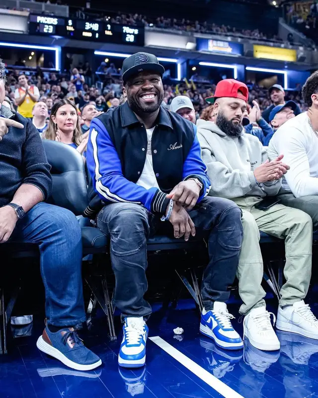 50 Cent outfit in Amiri, Louis Vuitton, and New Era, 2023