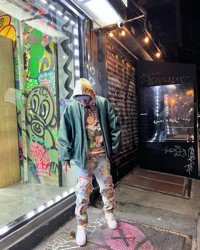 Joey Badass outfit in Prada, B.B. Simon, and Who Decides War, 2023