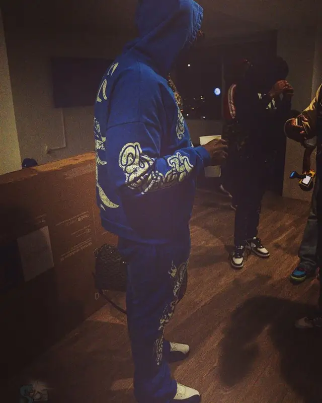 Peezy outfit in Jordan, Goyard, and Versace, 2023