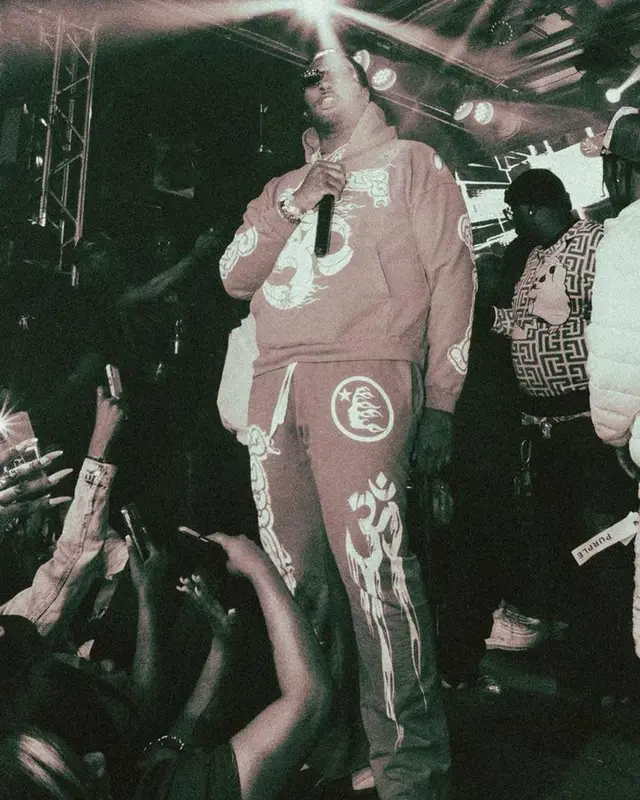Peezy outfit in Jordan, Goyard, and Versace, 2023