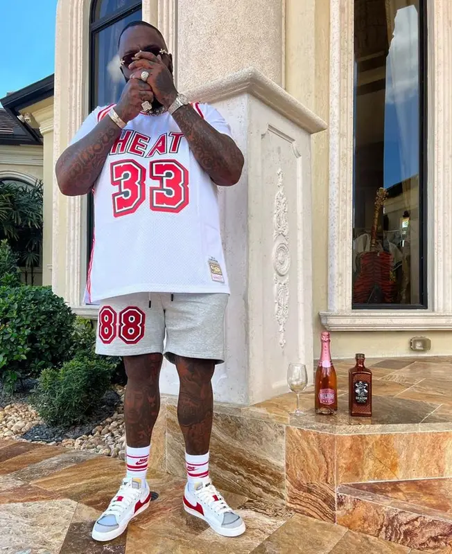 Rick Ross outfit in Mitchell & Ness, Miami Heat, and Nike, 2023