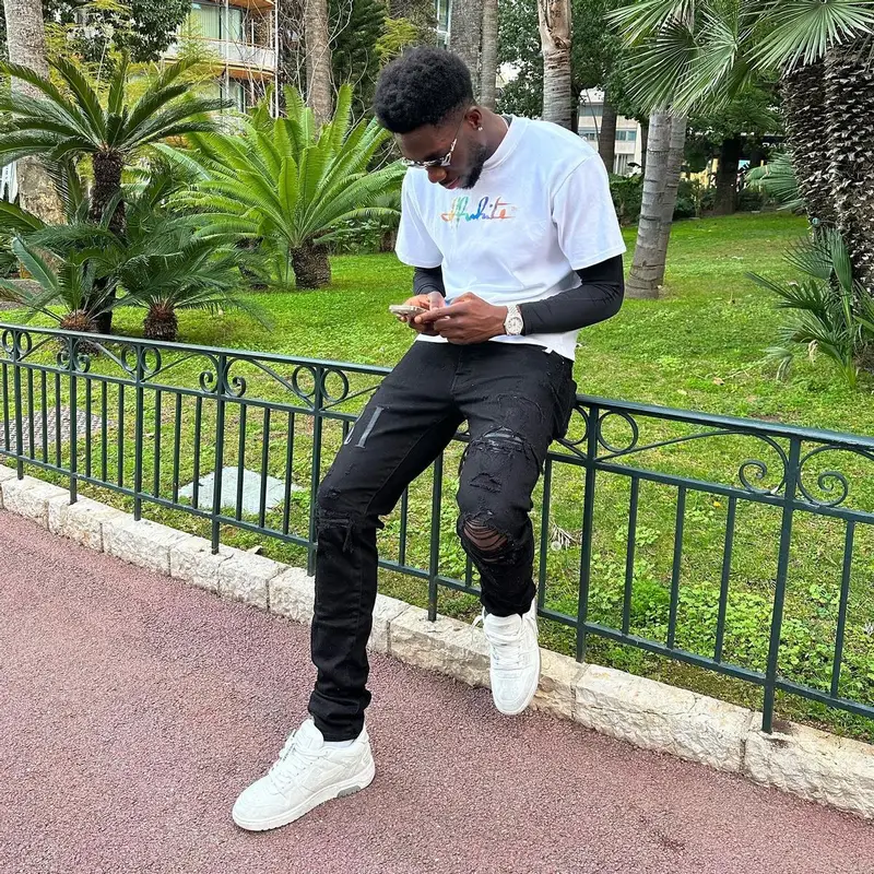 Alphonso Davies outfit in Off-White and Amiri, 2023