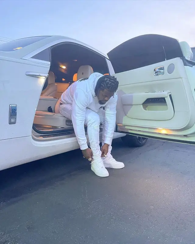 Rowdy Rebel outfit in Amiri, Nike, and Louis Vuitton, 2023