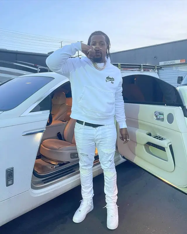 Rowdy Rebel outfit in Amiri, Nike, and Louis Vuitton, 2023