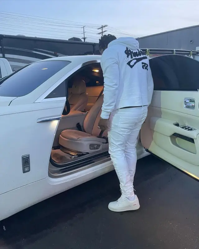 Rowdy Rebel outfit in Amiri, Nike, and Louis Vuitton, 2023
