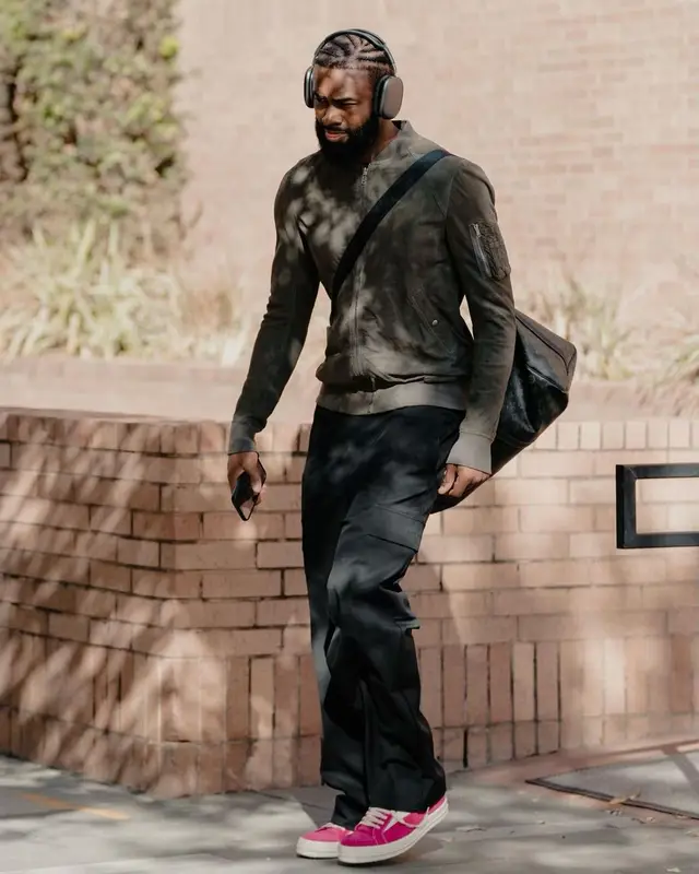 Jaylen Brown outfit in Rick Owens, Louis Vuitton, and Apple, 2023