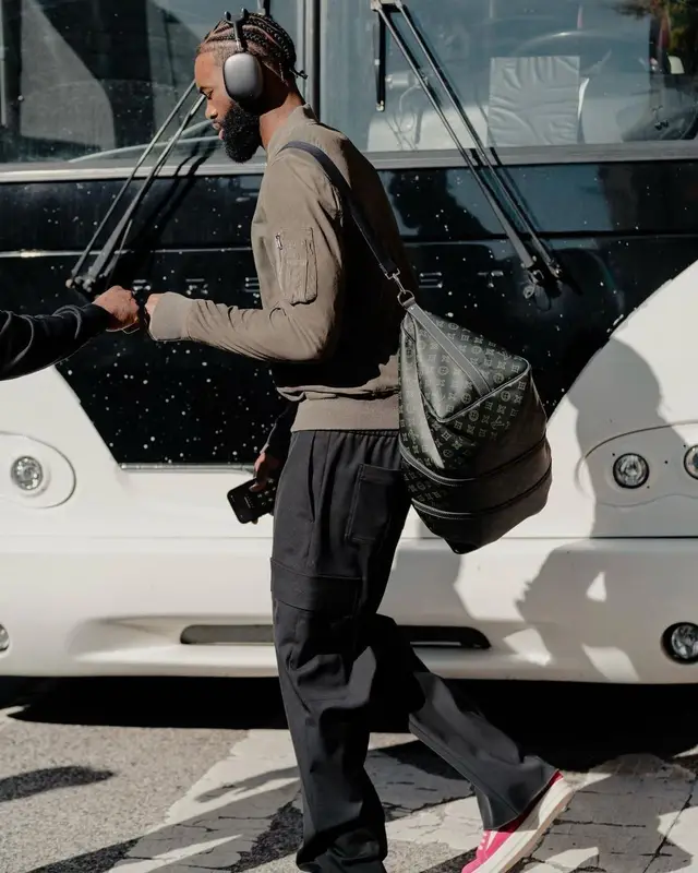 Jaylen Brown outfit in Rick Owens, Louis Vuitton, and Apple, 2023
