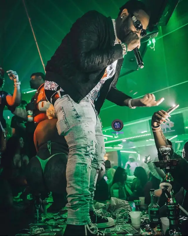 Peezy outfit in Amiri, Bottega Veneta, and Versace, 2023