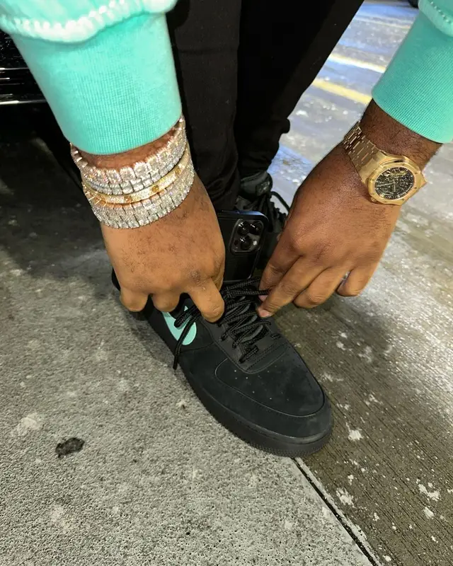 Tee Grizzley outfit in Supreme, Amiri, and True Religion, 2023