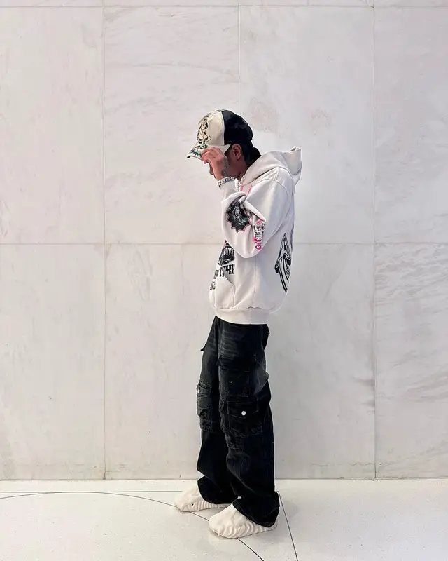 Yvngxchris outfit in Saints World, Half Evil 333, and Vivienne Westwood, 2023